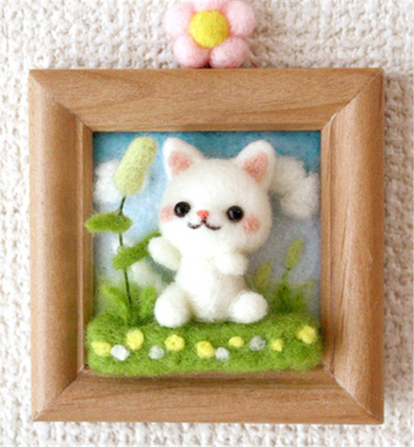 Various cute three-dimensional handmade photo frames of small animals made of wool felt