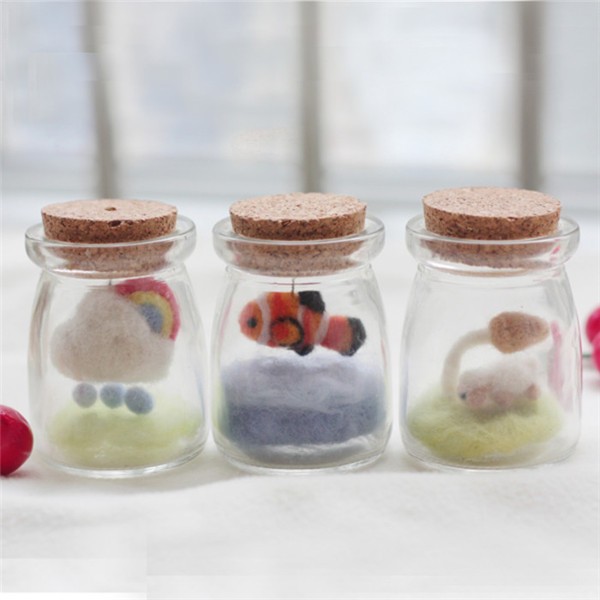 The world in three cute little bottles DIY made from wool felt