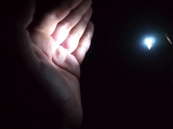 A small flashlight that uses body temperature to generate electricity