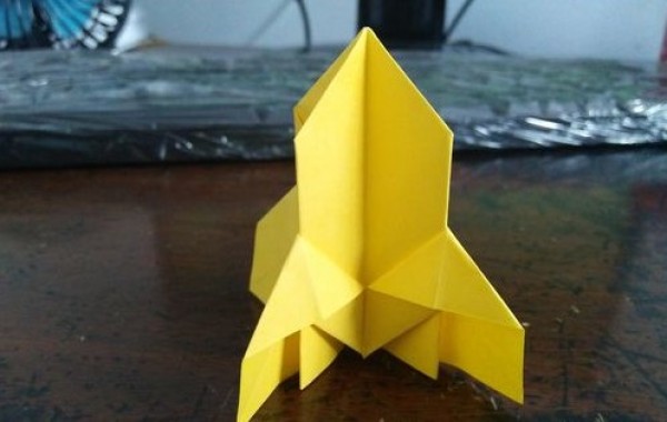 Childrens manual origami tutorial teaches you how to fold rockets