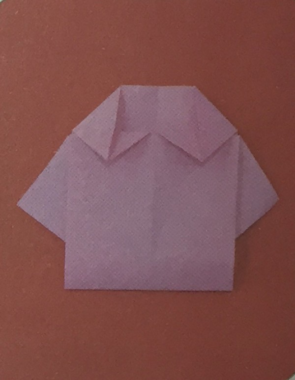 Pictures of steps for making origami shirts