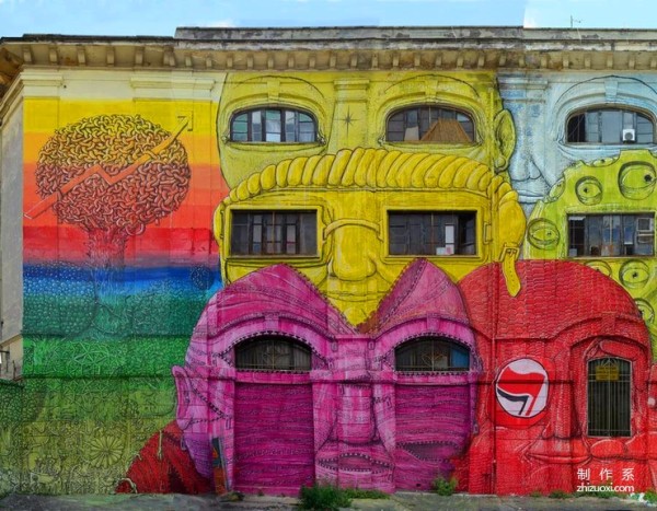 Colorful face mural art on the streets of Rome