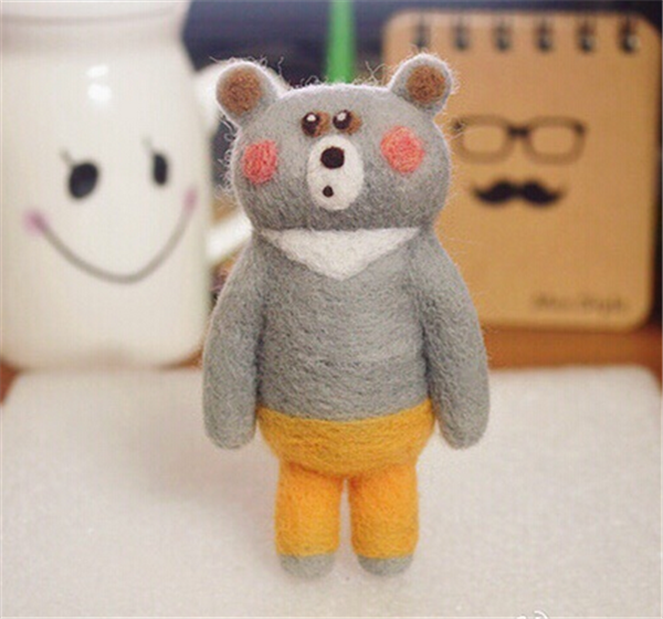 Various cute handmade wool felt pocket animals