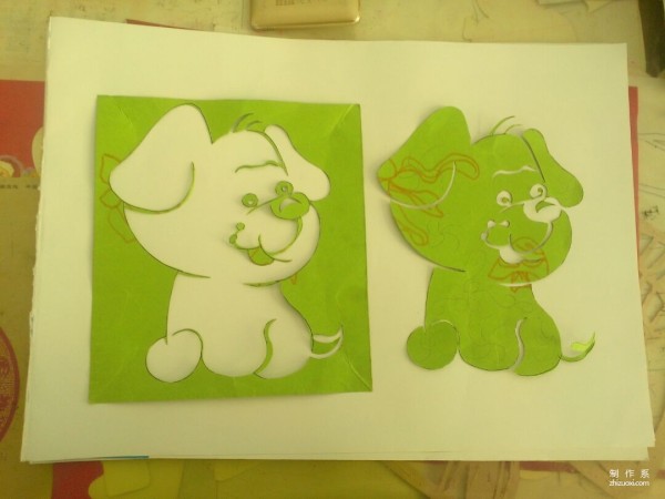 Teach you how to cut a cute puppy out of colored paper, how to cut a cute puppy by hand