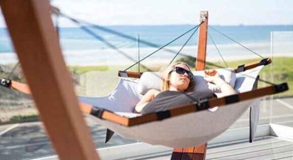 Hammock with curved support frame