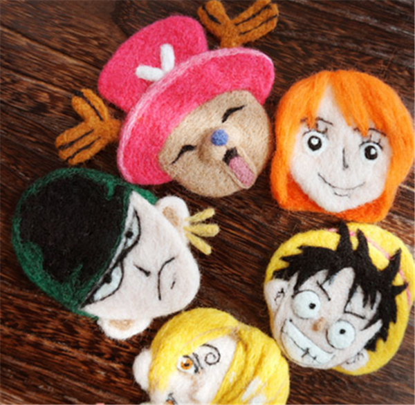 One Piece character heads poked out of handmade wool felt