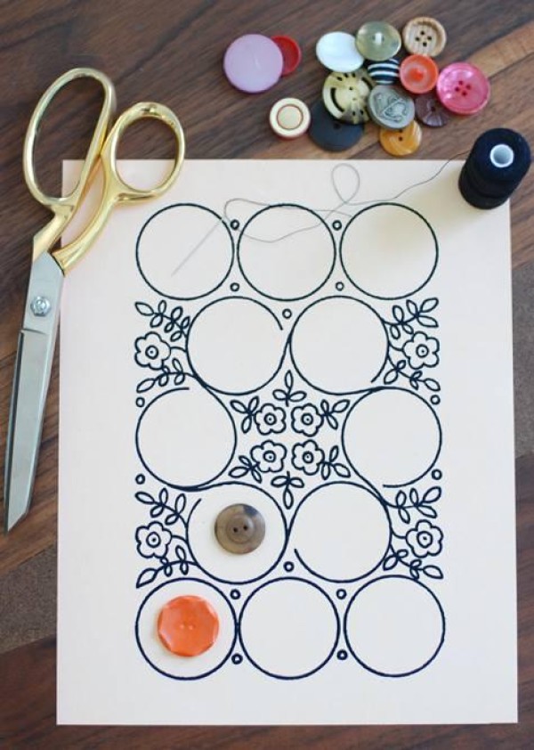 A simple DIY mural is completed with just a few strokes of buttons and pens.