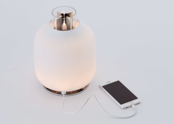 Light up a retro oil lamp with fire and the heat can charge your phone