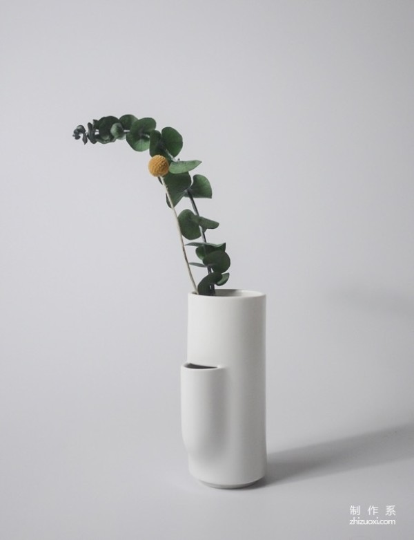 A vase with extra branches