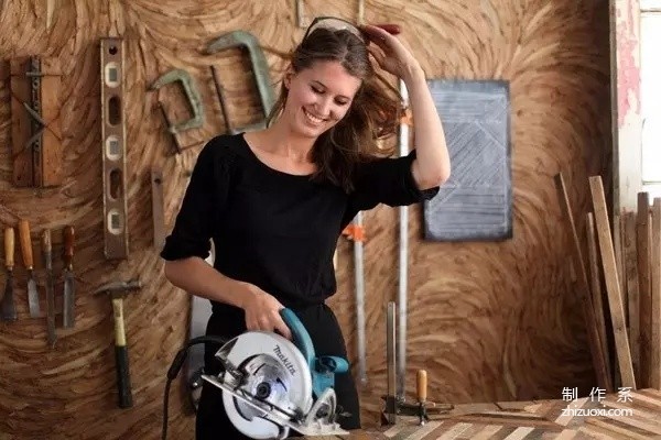 She is the most beautiful carpenter, turning piles of scrap wood into hot works of art