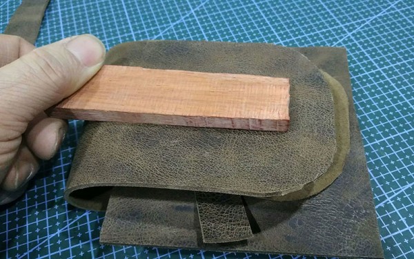 Mahogany buckle storage bag, from leather friends who know carpentry