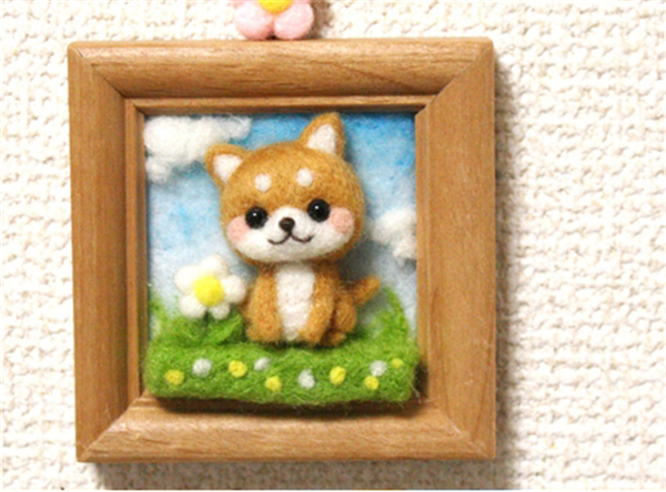 Various cute three-dimensional handmade photo frames of small animals made of wool felt