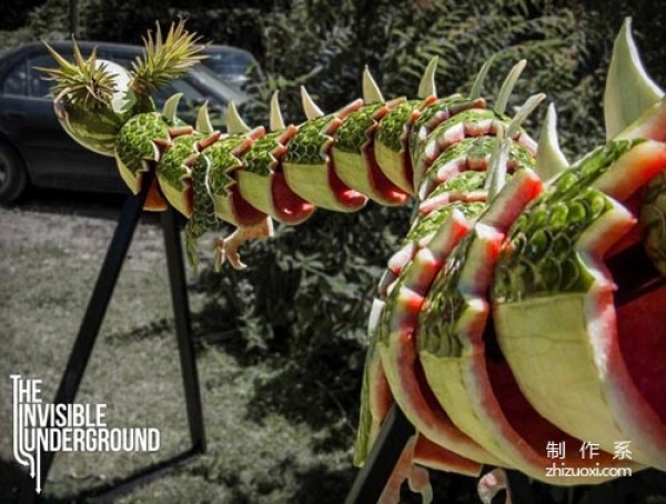 A dragon carved from watermelon and pineapple