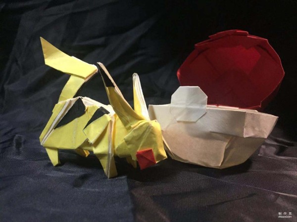 Paper art hand-made origami art, real-life tutorial on hand-made origami of the cartoon character Pikachu