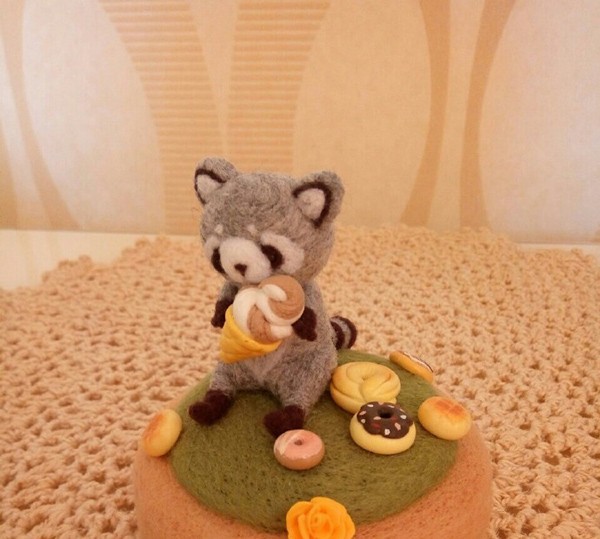 Wool felt DIY cute little raccoon who loves ice cream