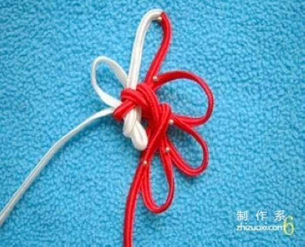 Illustration of the knitting method of the Chinese knot with eight ears and hollow brocade knot, tutorial on how to tie the hollow knot with eight ears and brocade