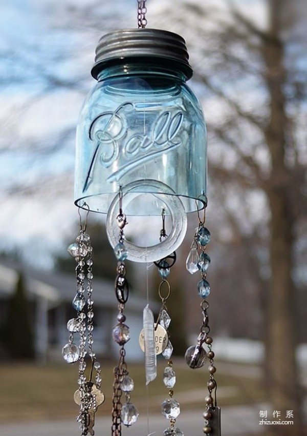 Collect discarded glass bottles and DIY them into beautiful glass wind chimes!