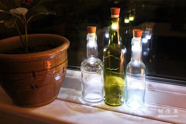 Cork caps that turn empty bottles into practical desk lamps