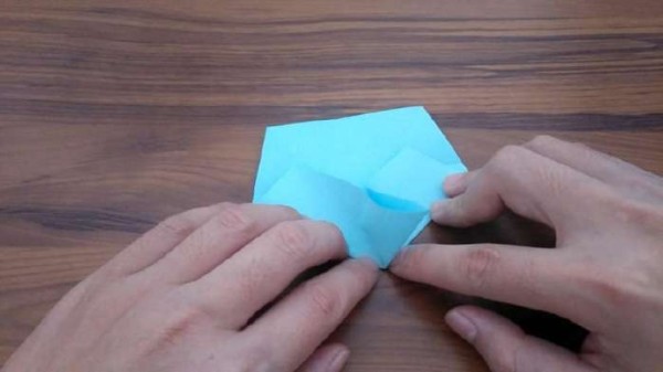 Fun origami for children. Teach children to fold a simple five-pointed star.