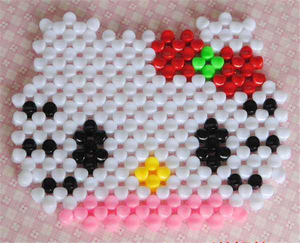 Super practical hand-beaded DIY potting mat with creative patterns and colors