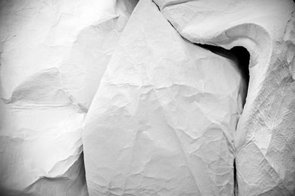 Talented artist Sipho Mabona folds a life-size elephant from a piece of white paper