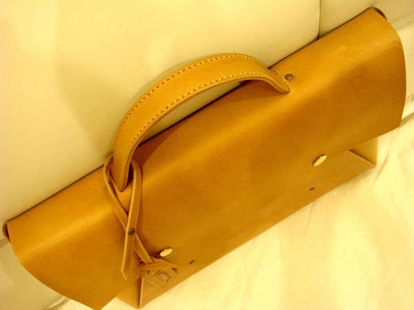 Minimalist briefcase, no stitching, all relying on rivets