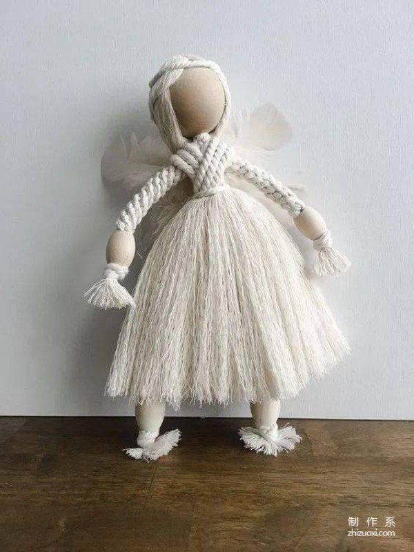 You can quickly make an adorable little doll by cutting a few cotton ropes and tying a few knots!