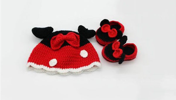 Red and black matching hand knitted baby shoes and hats