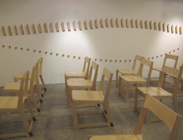 Folding seats hanging on the wall