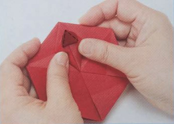 Creative handmade origami illustration of folding star-shaped candy box