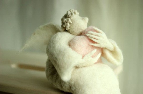 The fat angel embracing love handmade wool felt DIY products