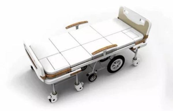 A hospital bed that can be separated into a wheelchair