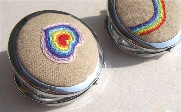 The sweetest hand-embroidered DIY rainbow love makeup mirror for Valentine’s Day