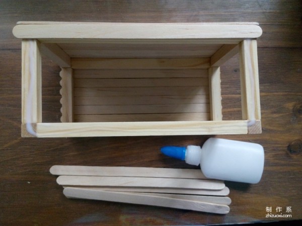 Illustrated tutorial on how to make a DIY ice cream stick storage box