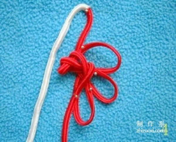 Illustration of the knitting method of the Chinese knot with eight ears and hollow brocade knot, tutorial on how to tie the hollow knot with eight ears and brocade