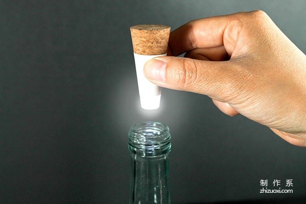 Cork caps that turn empty bottles into practical desk lamps Cover