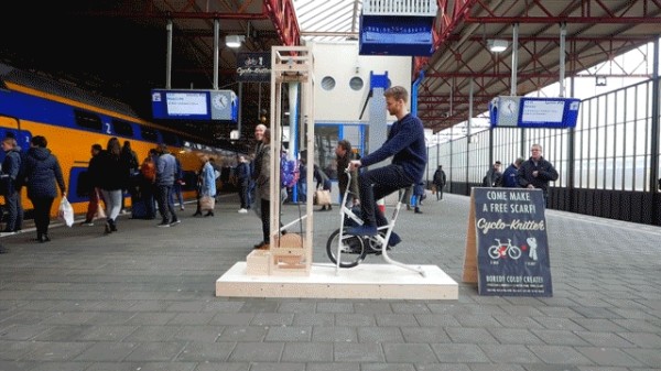 Handsome Dutch boy invents waiting tool and knits scarf while waiting