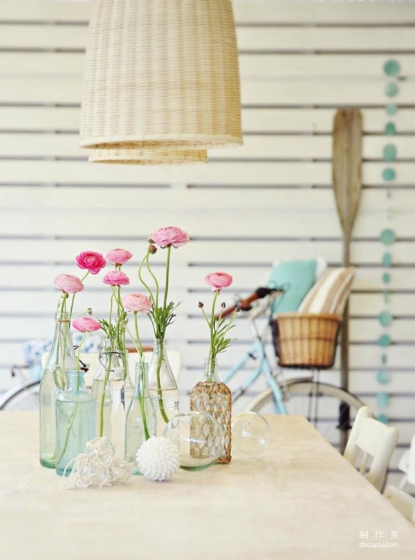 Beach hut decorated with coastal flowers