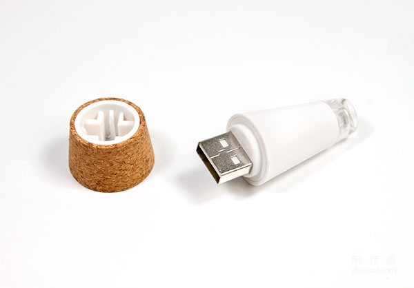 Cork caps that turn empty bottles into practical desk lamps