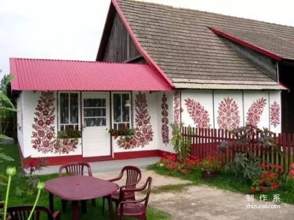 Plant flowers all over the wall, and accidentally the village becomes a fairy tale