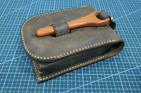 Mahogany buckle storage bag, from leather friends who know carpentry