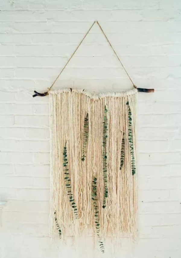 DIY eucalyptus tapestry decoration with small wooden sticks