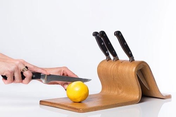 Wooden chopping board and knife holder