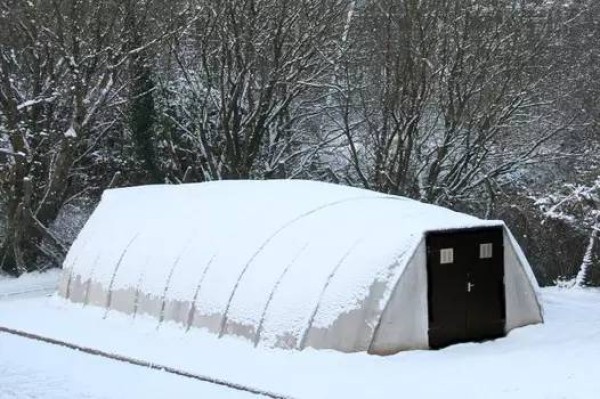 Temporary housing invented abroad, watered and hardened like concrete