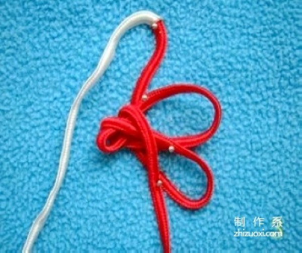 Illustration of the knitting method of the Chinese knot with eight ears and hollow brocade knot, tutorial on how to tie the hollow knot with eight ears and brocade