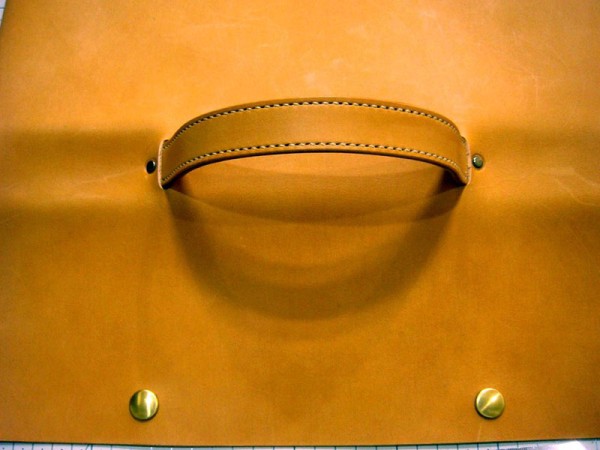 Minimalist briefcase, no stitching, all relying on rivets