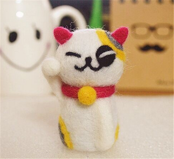 Various cute handmade wool felt pocket animals