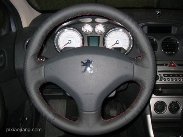 Hand-stitched steering wheel cover