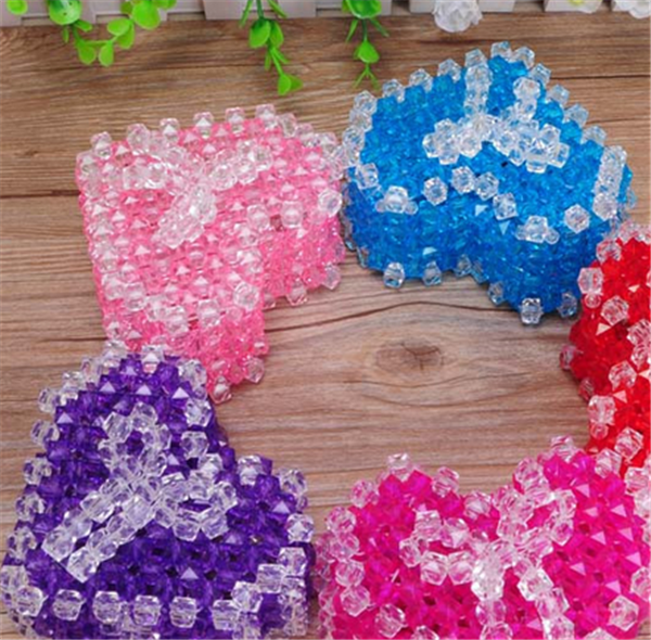 Handmade DIY beaded weaving to make a heart-shaped bow gift box