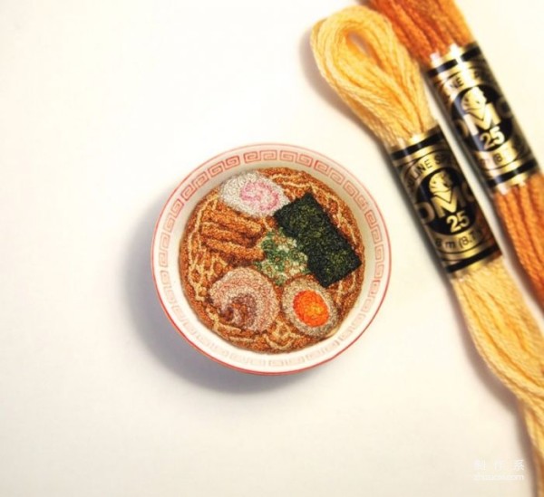 Using needles and threads instead of paintbrushes to embroider traditional Japanese delicacies